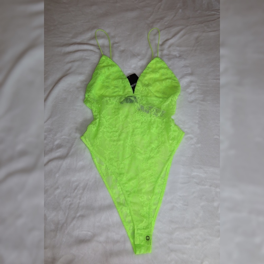 Neon green lace bodysuit.